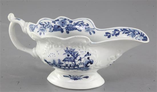 A Worcester Triangular Platform pattern blue and white sauceboat, c.1755, length 19.5cm